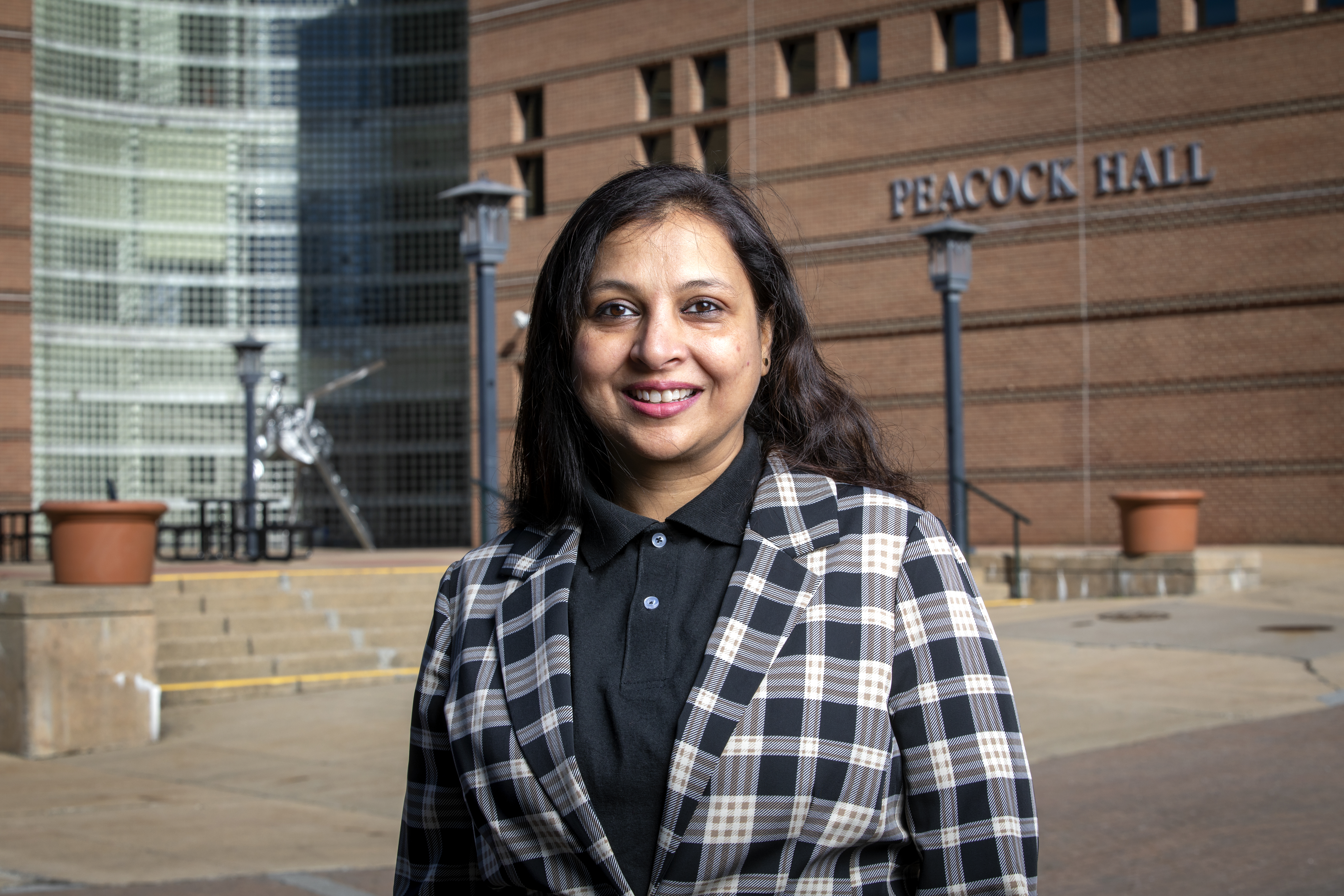 Headshot of Lubna Nafees, PhD, standing outside. 