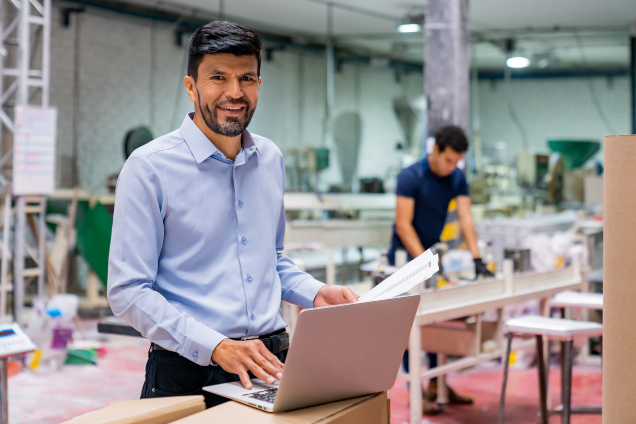 A Supply Chain Manager at Work in Factory